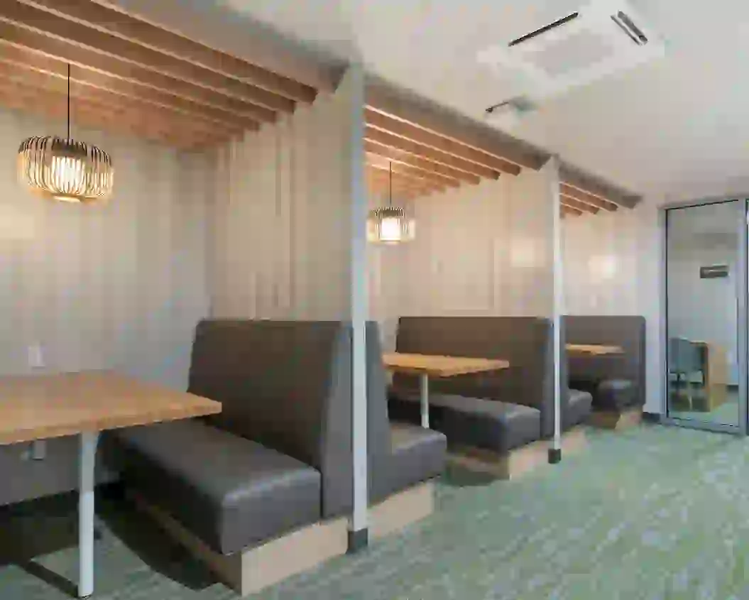 Group and private study areas at Identity Logan Park